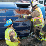 Chief Brad Johnston directs the roof flap process